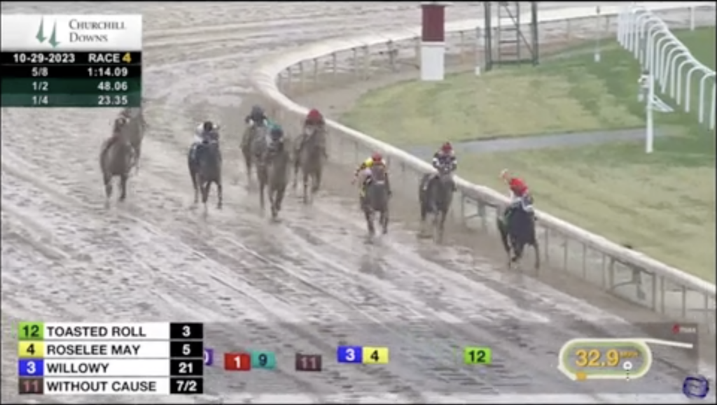 Screenshot from the race replay video (10.29.23): Toasted Roll leads the field at the top of the stretch